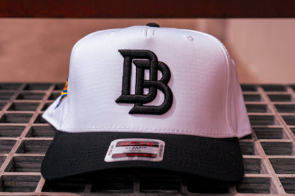 Choose one Chalio’s collab hat: White / Black — included in the Player & Mom Bundle.
